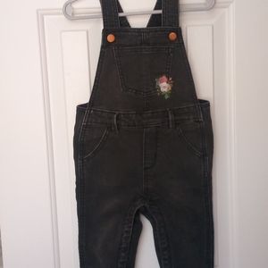Black overalls with floral detail
